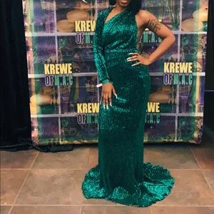 Green open back one shoulder gown